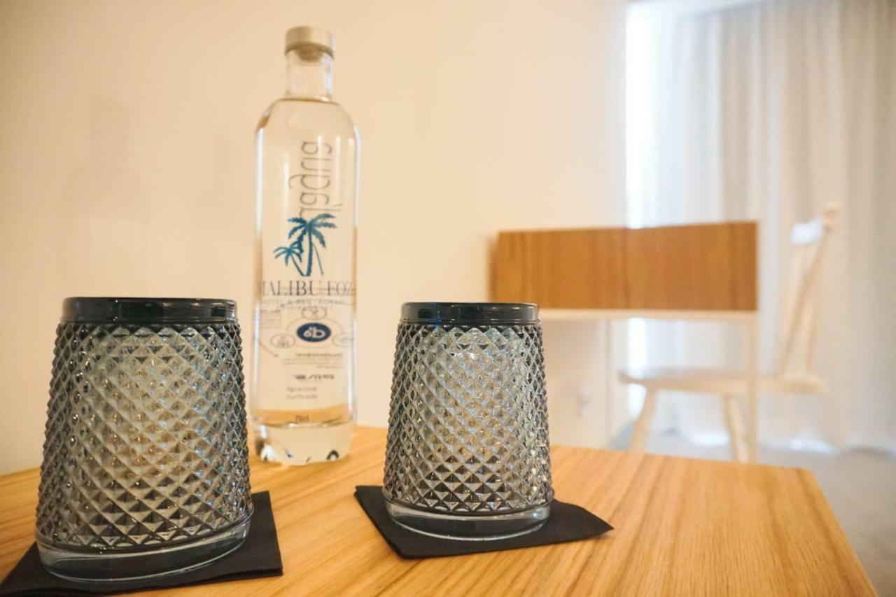 Malibu Foz Hotel - La Maison Younan Figueira da Foz Exterior photo A bottle of water