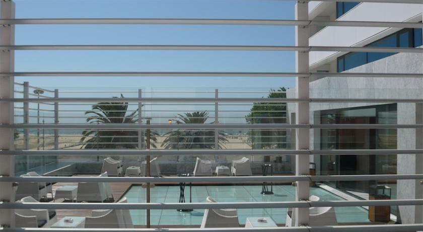 Malibu Foz Hotel - La Maison Younan Figueira da Foz Exterior photo View of the beach from the hotel