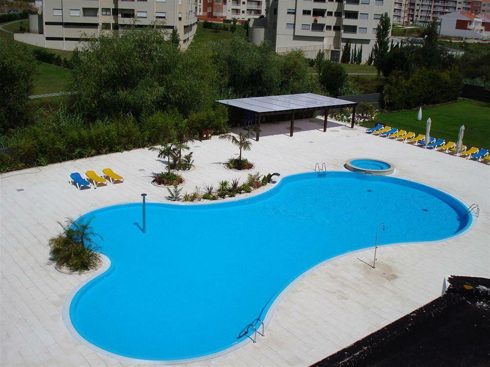 Malibu Foz Hotel - La Maison Younan Figueira da Foz Exterior photo Swimming pool in the complex